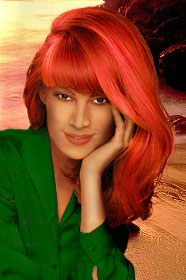 [Dark skinned beauty with wavy firey red hair]