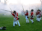 A couple of Redcoats firing at the retreating colonials.
