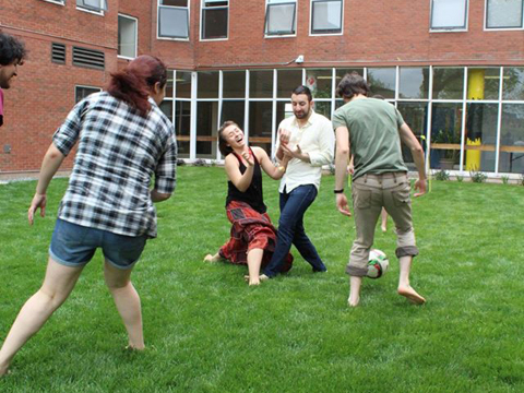 LUChA members playing soccer at the LUChA end of the year celebration