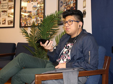 LUChA member listening to some radical music