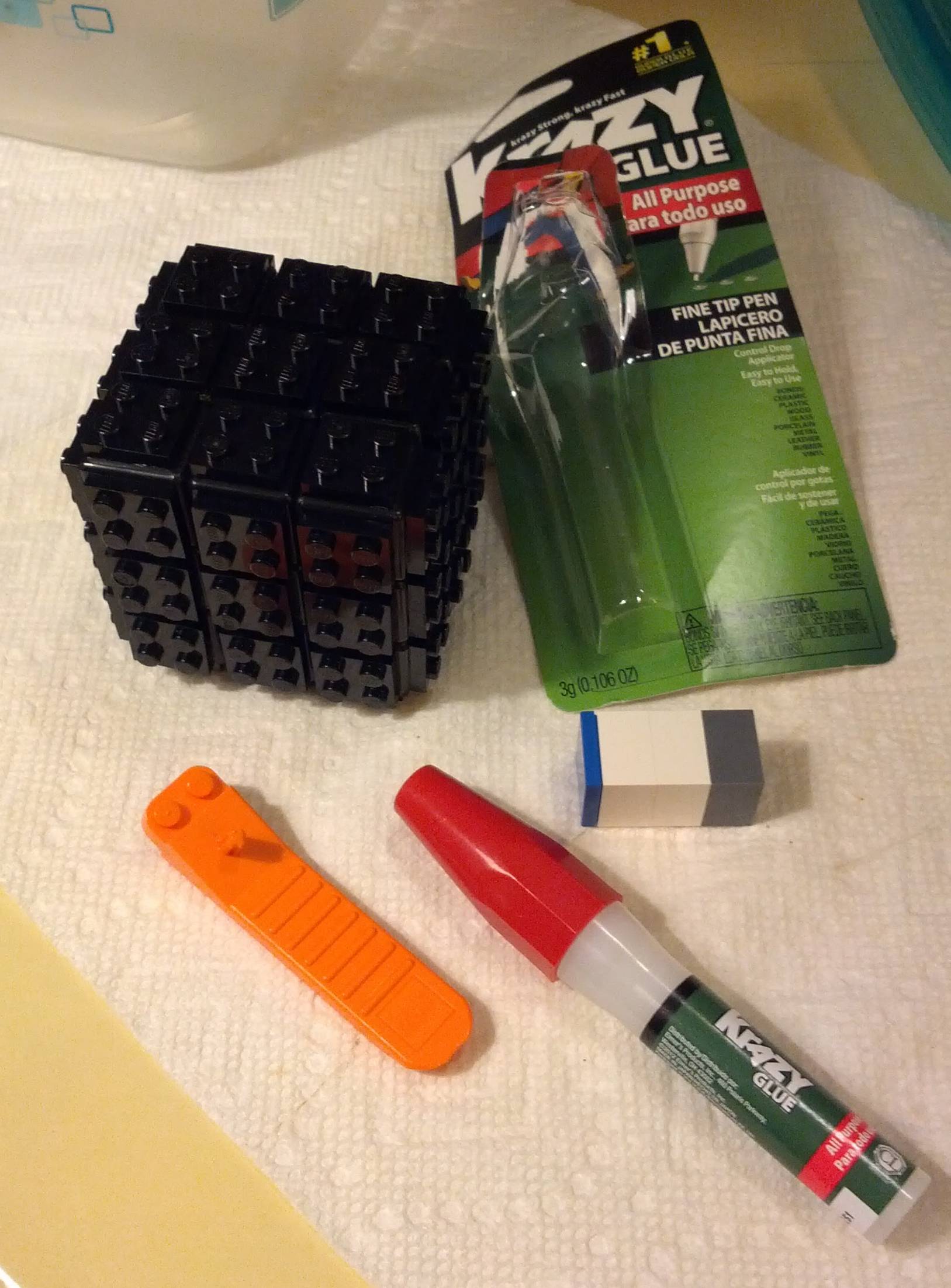 black lego cube with tools